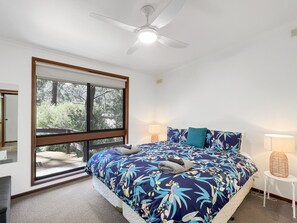 Elegant master bedroom, featuring a luxurious king-size bed for your utmost comfort.