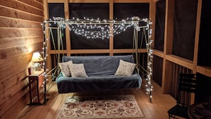 Relaxing swing for two - a favorite place to enjoy the sounds of the creek