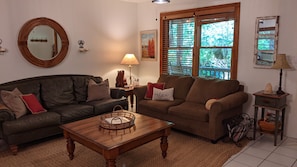 Spacious living with lounging for two or seating for five. Pullout sofa.
