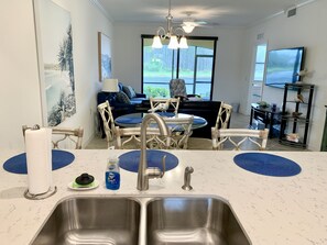 Kitchen, dining area, living room. 