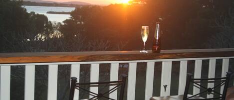 Watch the sunsets from the upstairs deck