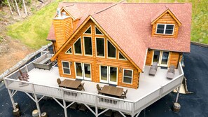 2 CHAISE LOUNGES AND LARGE COUCH BY FIREPLACE DIRECT PATIO ACCESS FROM 2 MASTERS