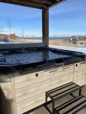 Your own private Bullfrog hot tub sits on the back patio.