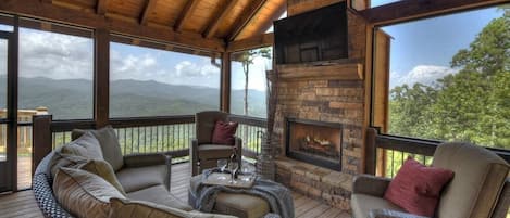 Relax in the screened in porch and watch the sunset while cozying up to the wood fireplace. 