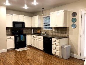 Fully equipped kitchen for a full meal or snacks! Open concept feels so spacious