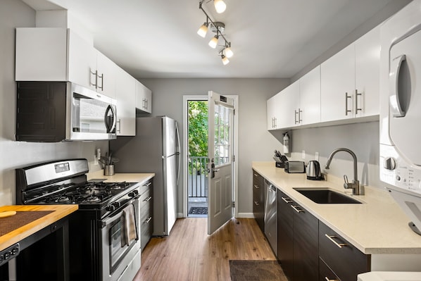 Brookwood Courtyard Condos - Complete Galley Kitchen with Full-Size Appliances
