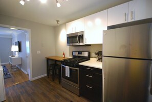 Brookwood Courtyard Condos - Kitchen - Bamboo Bar Table has Charging