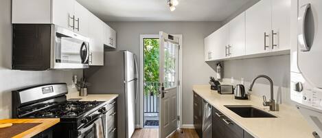 Brookwood Courtyard Condos - Complete Galley Kitchen with Full-Size Appliances