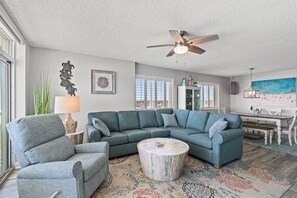 Comfy recliner and sofa - ample seating for everyone.