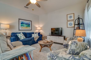 Comfy living room allows seating for the whole family