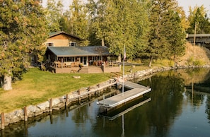 Kick back and relax on a large dock.  Great shore frontage.  