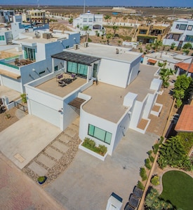 Breathtaking Custom Home in Sandy Beach with Great Amenities!