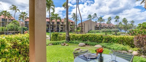 Ground floor unit with lush garden and peek-a-boo ocean views!