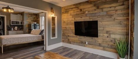 Wood shiplap accent walls are the focal point of the space