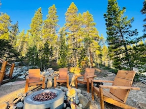 Fire Pit Evenings:
Gather around the gas firepit, seated in Adirondack chairs, and let the dancing flames and whispering Aspens create the perfect backdrop for unforgettable conversations.