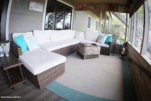 Just in case the weather isn't perfect, this porch/sunroom fits the bill.