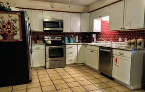 Large open modern kitchen area for cooking meals. 