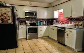 Large open modern kitchen area for cooking meals. 