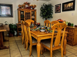 Dining room area with beautiful all wood furniture. 