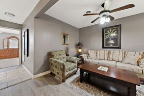 Living room hallway view to bathroom and bedroom 1