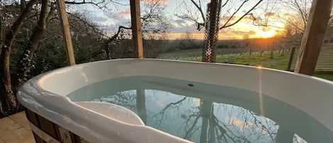 The Wood Fired Hot tub and an evening sunset!
