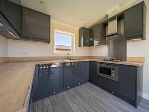 Cabinetry, Countertop, Kitchen Appliance, Kitchen Sink, Kitchen Stove, Home Appliance, Sink, Tap, Wood, Kitchen