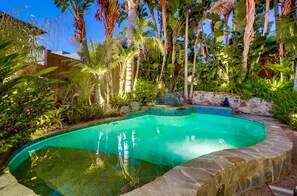 Relax in your private backyard oasis and pool.