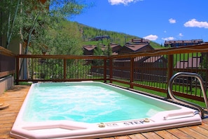 Open hot tub, ready for you after a day of hiking & adventures.