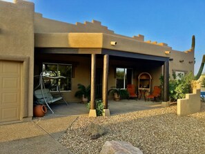 Front backyard with swing and sitting area