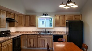 Large kitchen with full sized upscale appliances