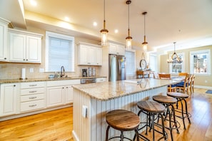 Beautiful kitchen with granite counters and stainless steel appliances 