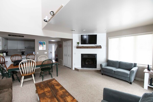 Updated entertainment center, smart TV, gas fireplace, great space.