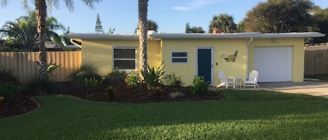 Beautiful and manicured, tropical yard- steps from our beach!