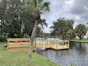 Deck with ramp and boat dock.  Waterway will lead to the James E. Grey preserve.