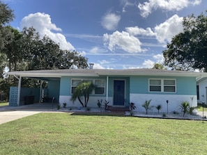 The house has been freshly painted and landscaped.