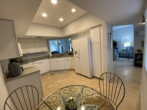 Kitchen, with pass through to dining area