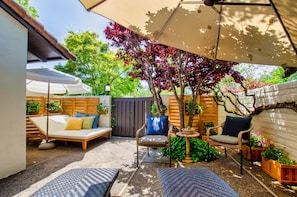 Front Patio entrance, lounge chairs and day bed