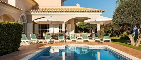 Front of the house with pool view