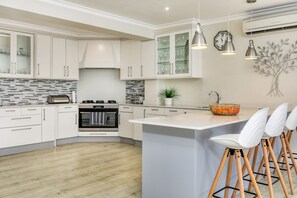 Open plan kitchen with gas hob.