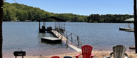 Enjoy the fire pit and charcoal grill after a day on the lake. 