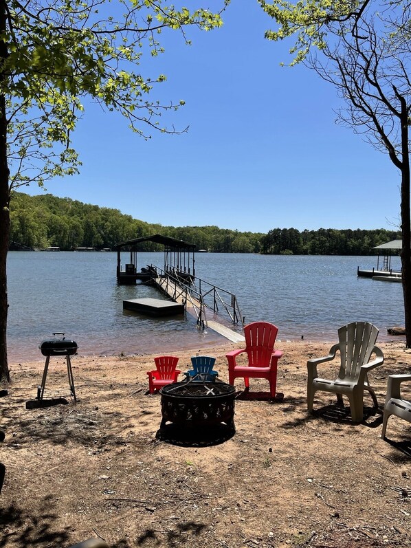 Enjoy the fire pit and charcoal grill after a day on the lake. 