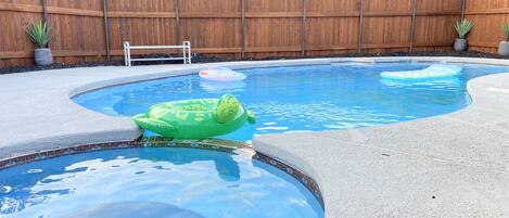 Grand pool and plenty of privacy in the backyard.