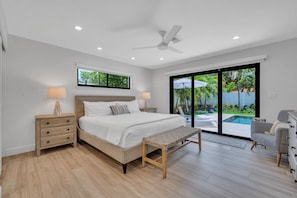 Master Bedroom comes with a King-sized bed, master bathroom and pool access.