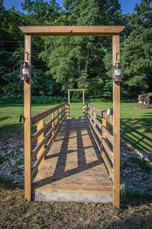 Bridge over the Creek to bonfire pit and Barn Yard.
