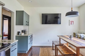 With an open plan and a spacious dining and lounging area, the kitchen serves multiple purposes.