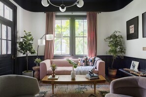 Plenty of seating space for your group between all 3 living room spaces :)