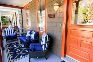 Enjoy your morning coffee on the covered porch with views of the Academy chapel.