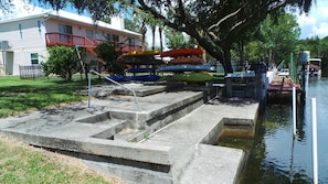 Concrete dock area with graduated steps and fish cleaning station