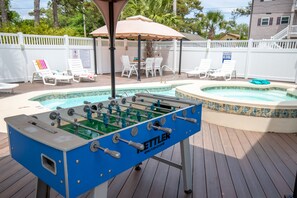 Take a break from swimming and play foosball in the shade!