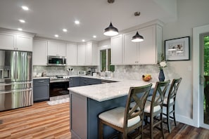 Well appointed, newly renovated kitchen has all you need to prepare meals.